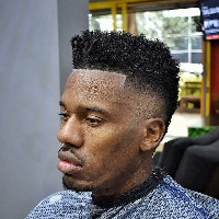 Bodega Barbers — high fade curly top